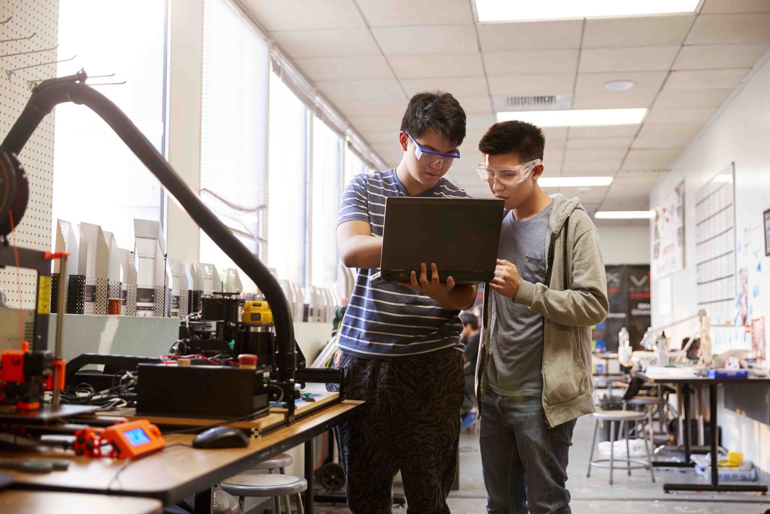 two male college students using laptop computer in 2021 08 26 16 13 32 utc scaled